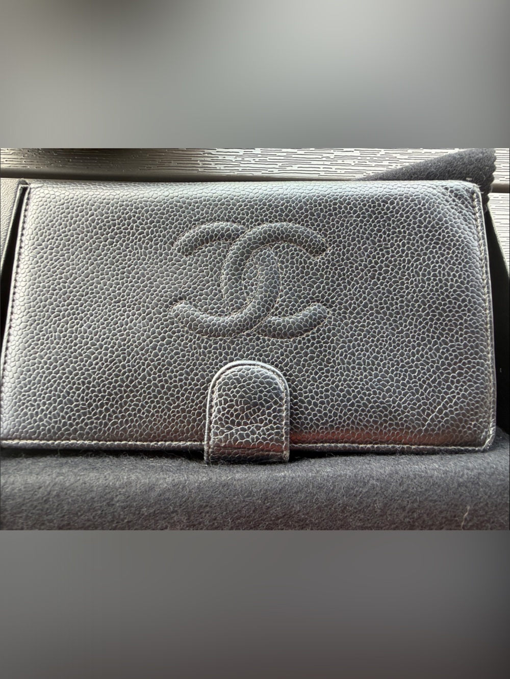 Authentic CHANEL Black Pebbled Leather Wallet Phone Case with Embossed CC